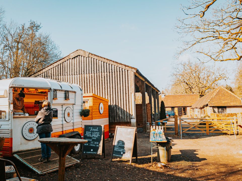 Food truck stopped and serving customers outdoors