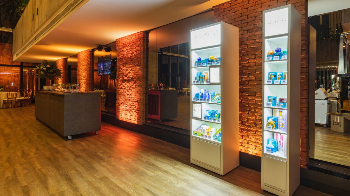 Illuminated shelves stocked with restaurant products