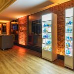 Illuminated shelves stocked with restaurant products