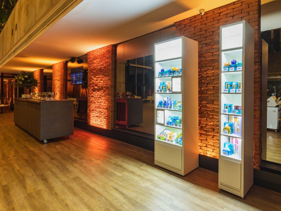 Illuminated shelves stocked with restaurant products