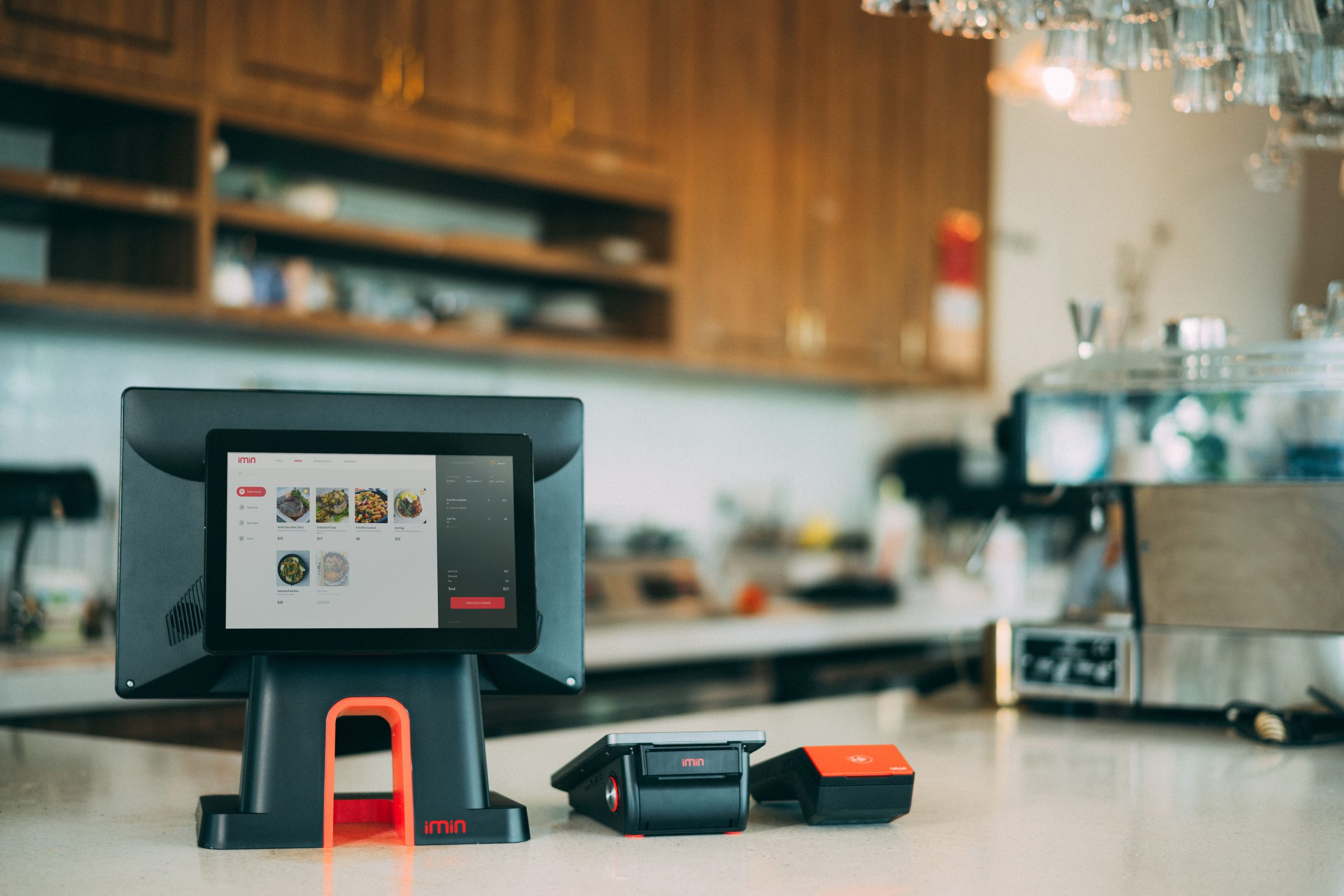 Restaurant POS counter with digital point-of-sale terminal