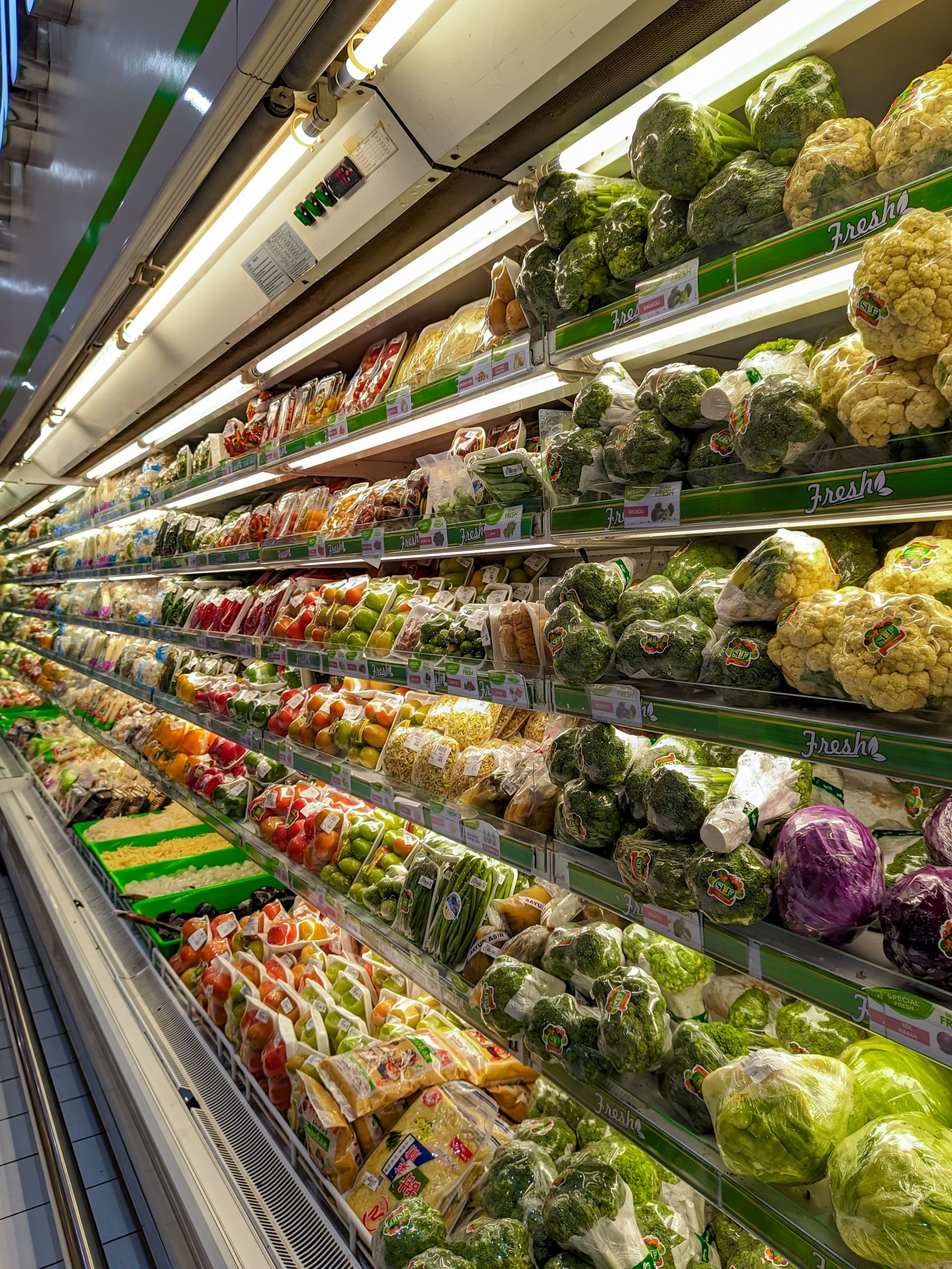 Colorful fresh produce aisle in a grocery store